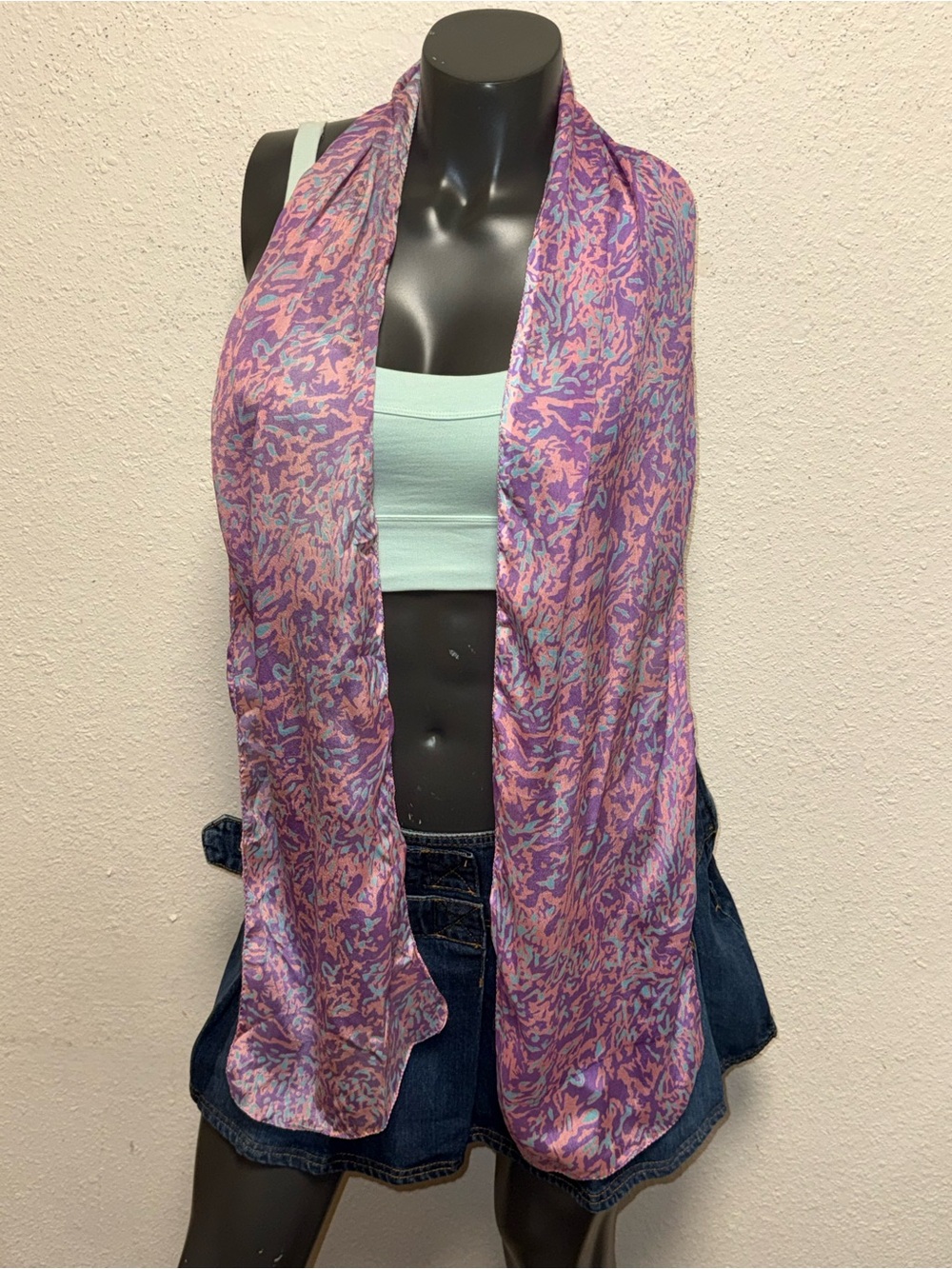 Scarf is a vibrant pink and purple leopard 100% Silk.
